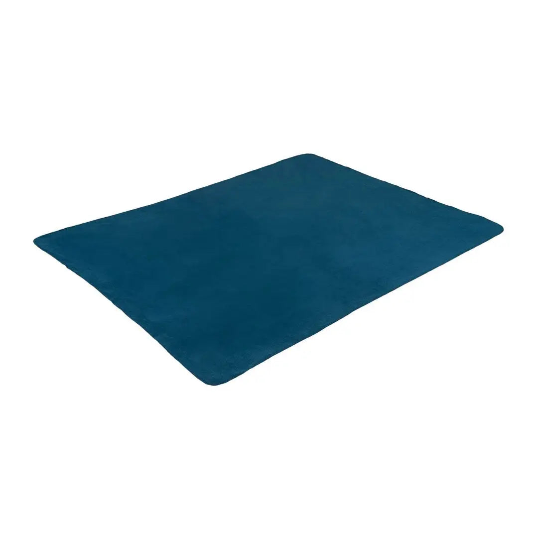 Rectangular teal floor mat under Highlander Fleece Blanket for cozy country clothing vibes