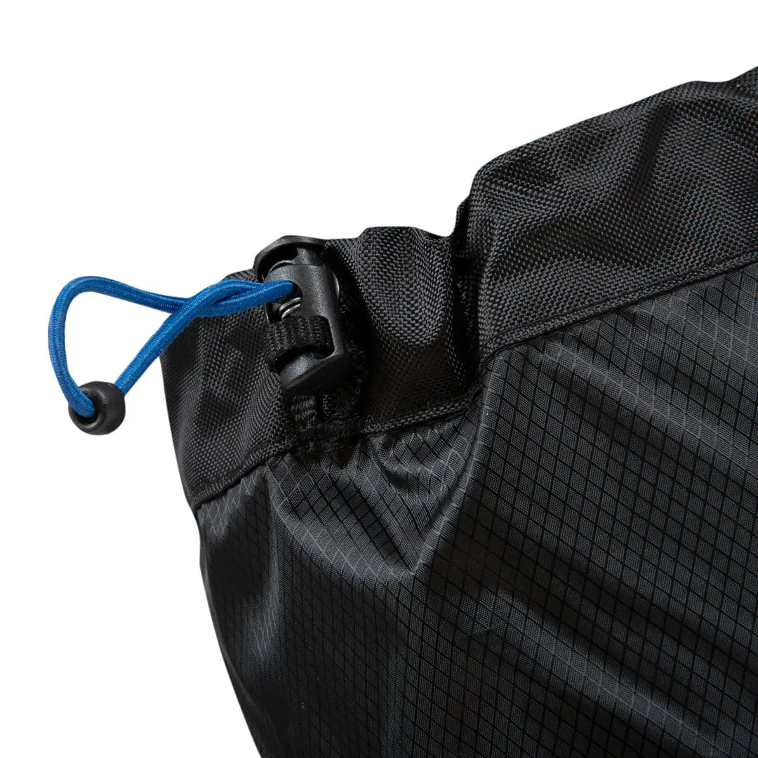 Black backpack with blue carabiner, perfect for country clothing and outdoor adventures