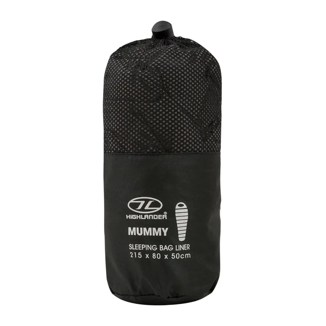 Black Highlander Mummy Sleeping Bag Liner in a compact storage sack for camping and hunting