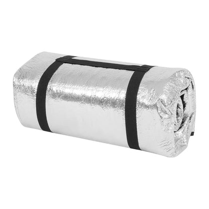 Rolled-up silver Highlander survival blanket secured with black straps for camping and hunting