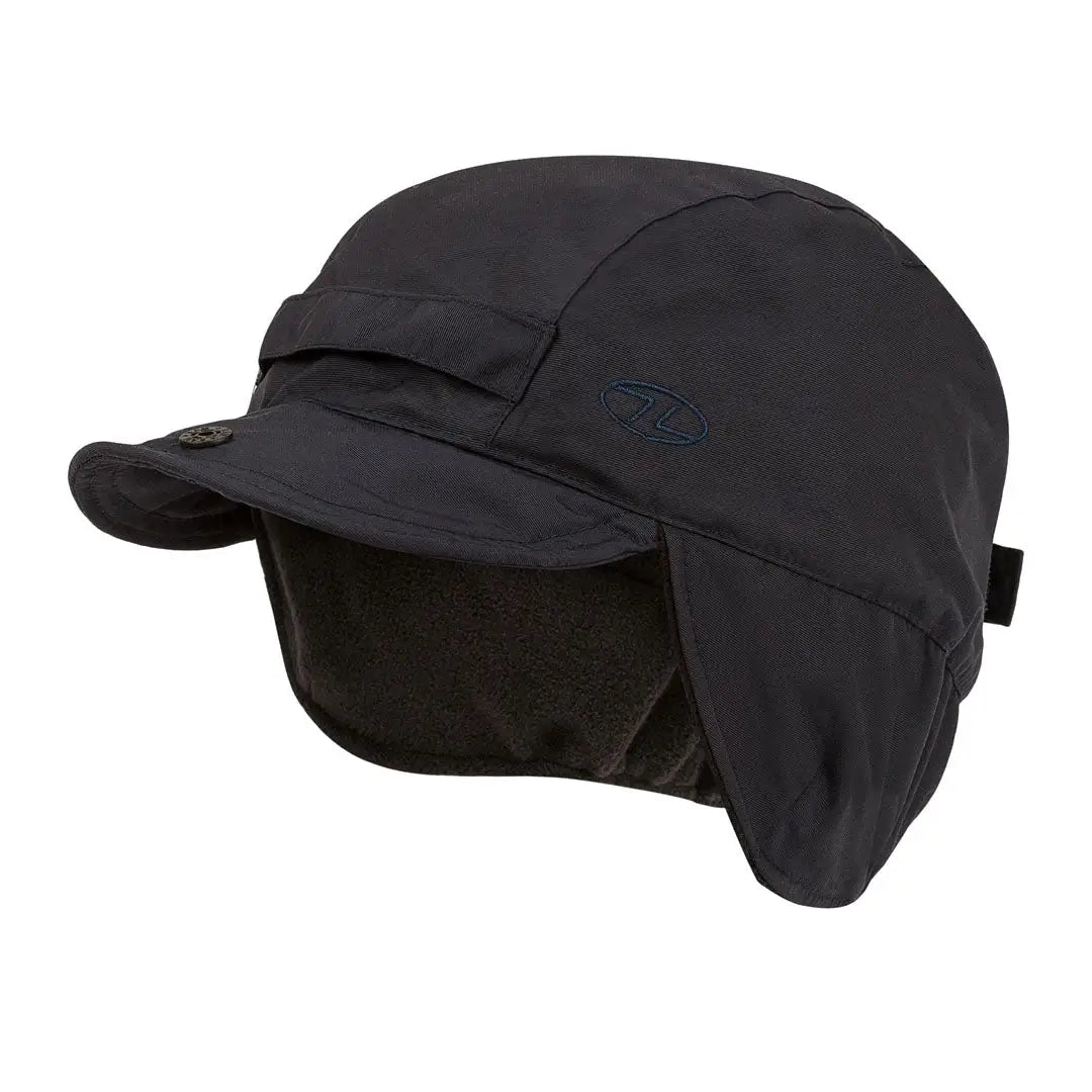 Black winter cap with ear flaps and a brim from Highlander Waterproof Mountain Hat