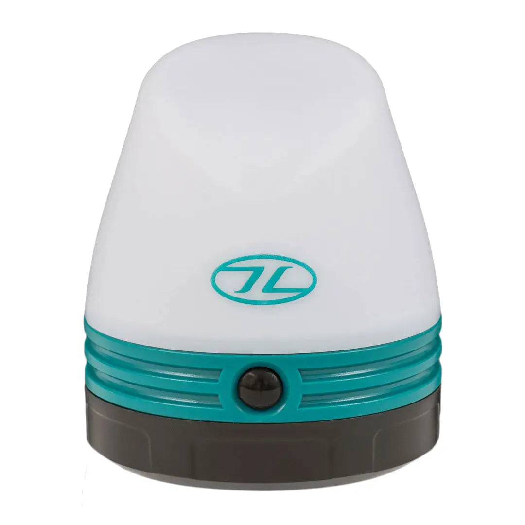 Portable Highlander Wee Lantern with white dome and teal accents, a versatile camping light