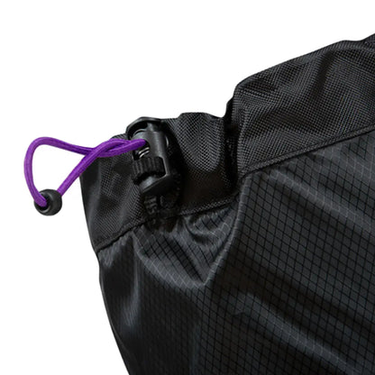 Black drawstring bag with purple cord, perfect for Highlander Women’s Glenshee Gaiters and outdoors