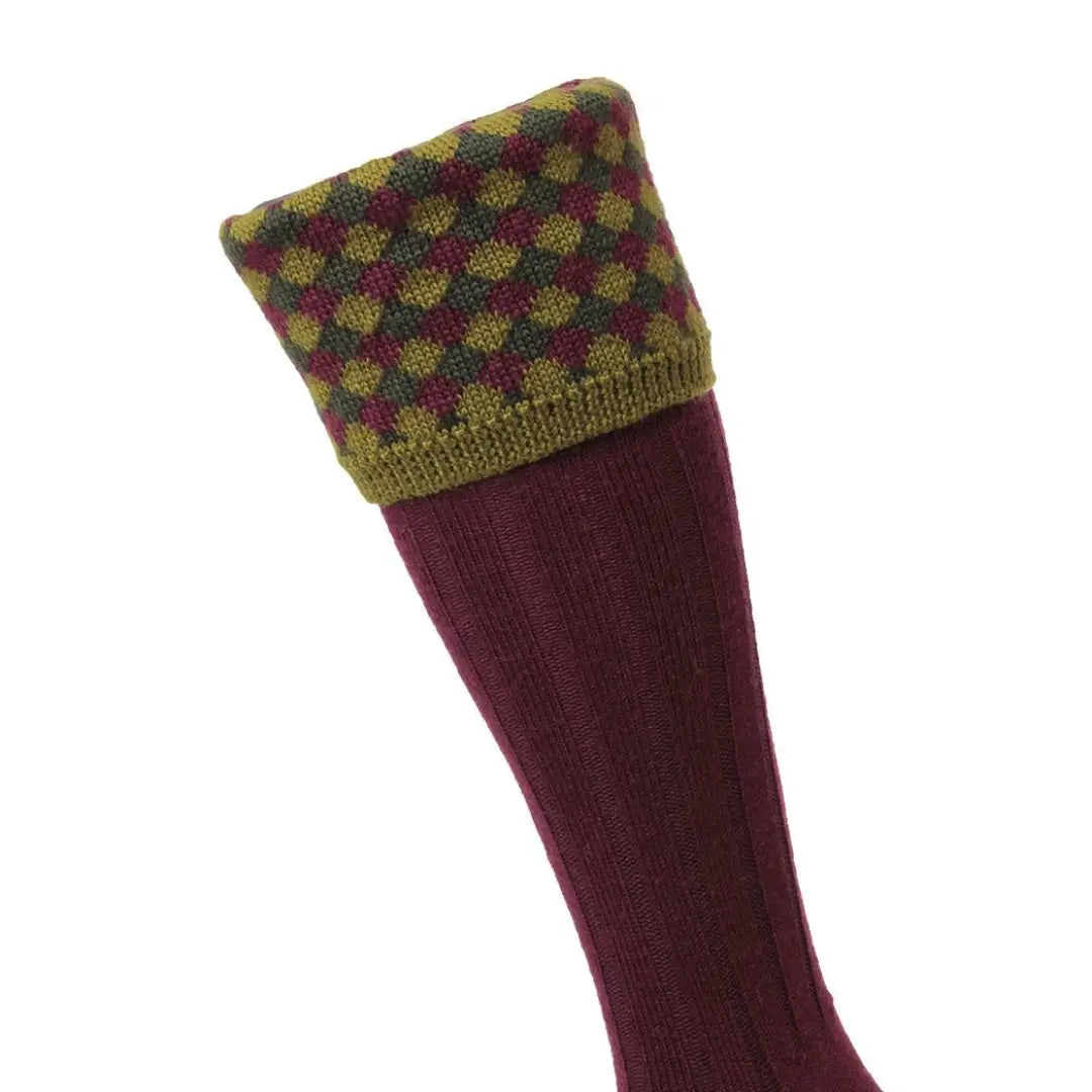 Burgundy knit sock with olive green cuff in HJ Hall Diamond Harlequin Shooting Socks