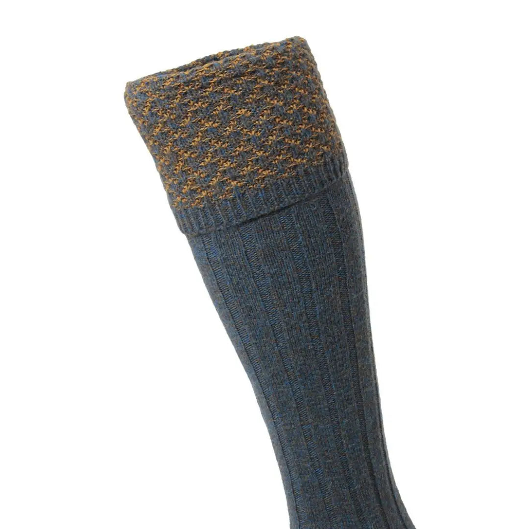 Colorful knitted sock with patterned cuff from HJ Hall Hatfield Honeycomb Texture Shooting Socks