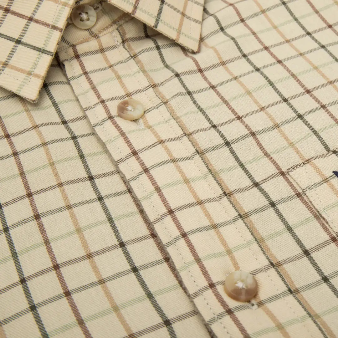 Cream-colored plaid Fife Birch fleece lined shirt with a chic brown and tan grid pattern