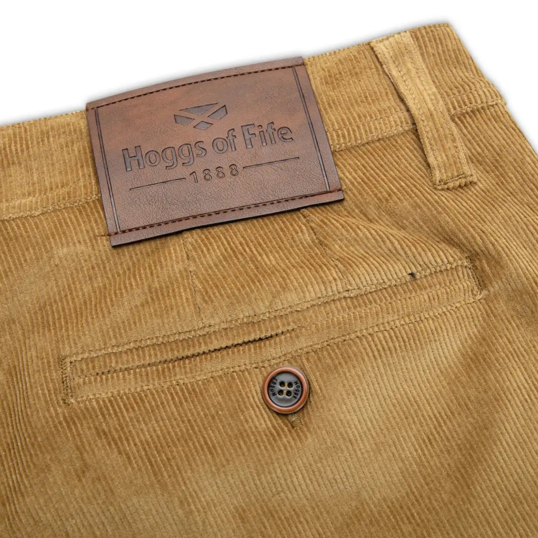 Mustard yellow corduroy pants with leather patch for stylish country clothing adventures