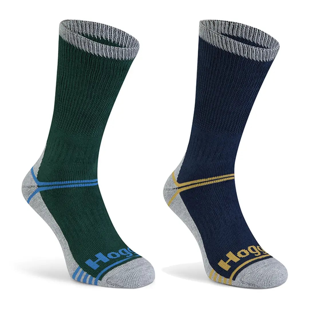 Two pairs of dark green and navy blue athletic socks for hunting and the outdoors