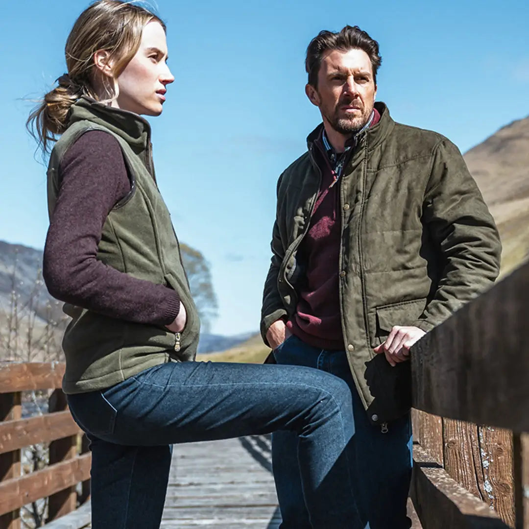 Two people in Hoggs Of Fife Glenesk Quilted Jacket enjoying the outdoors in country clothing