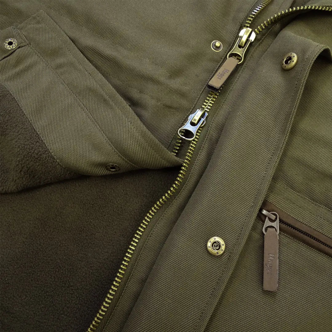 Military-style olive green jacket with zippers for the Kincraig Field Waistcoat