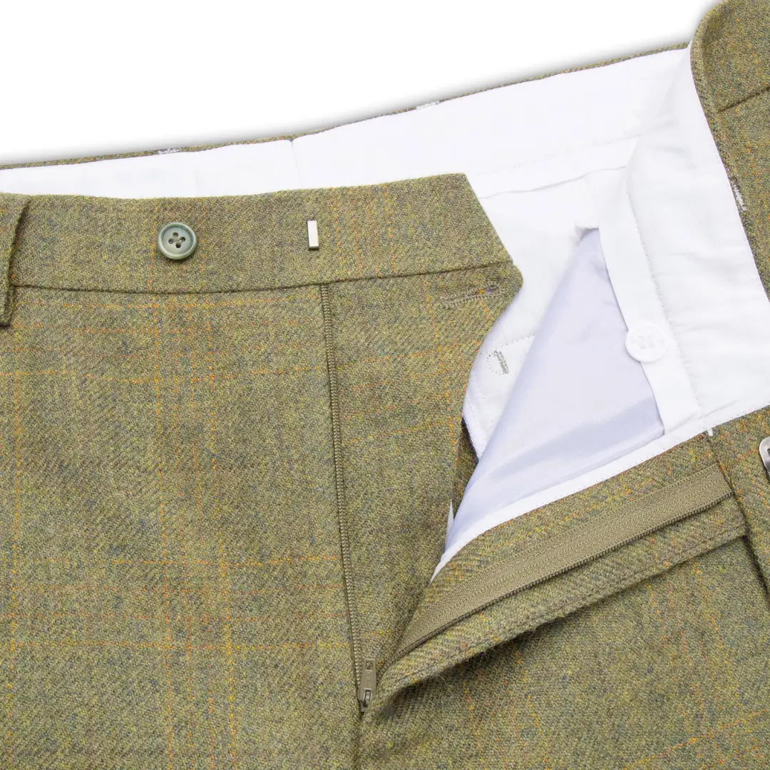 Pair of olive green Hoggs Of Fife Kinloch Tweed Trousers with a partially open fly