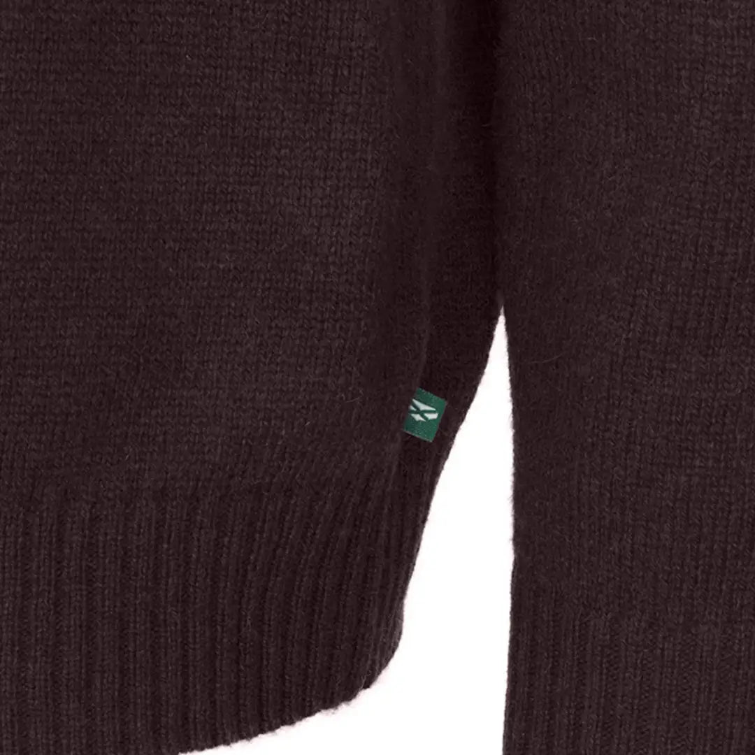 Dark brown knit zip neck pullover with a green tag from Hoggs of Fife, expertly designed