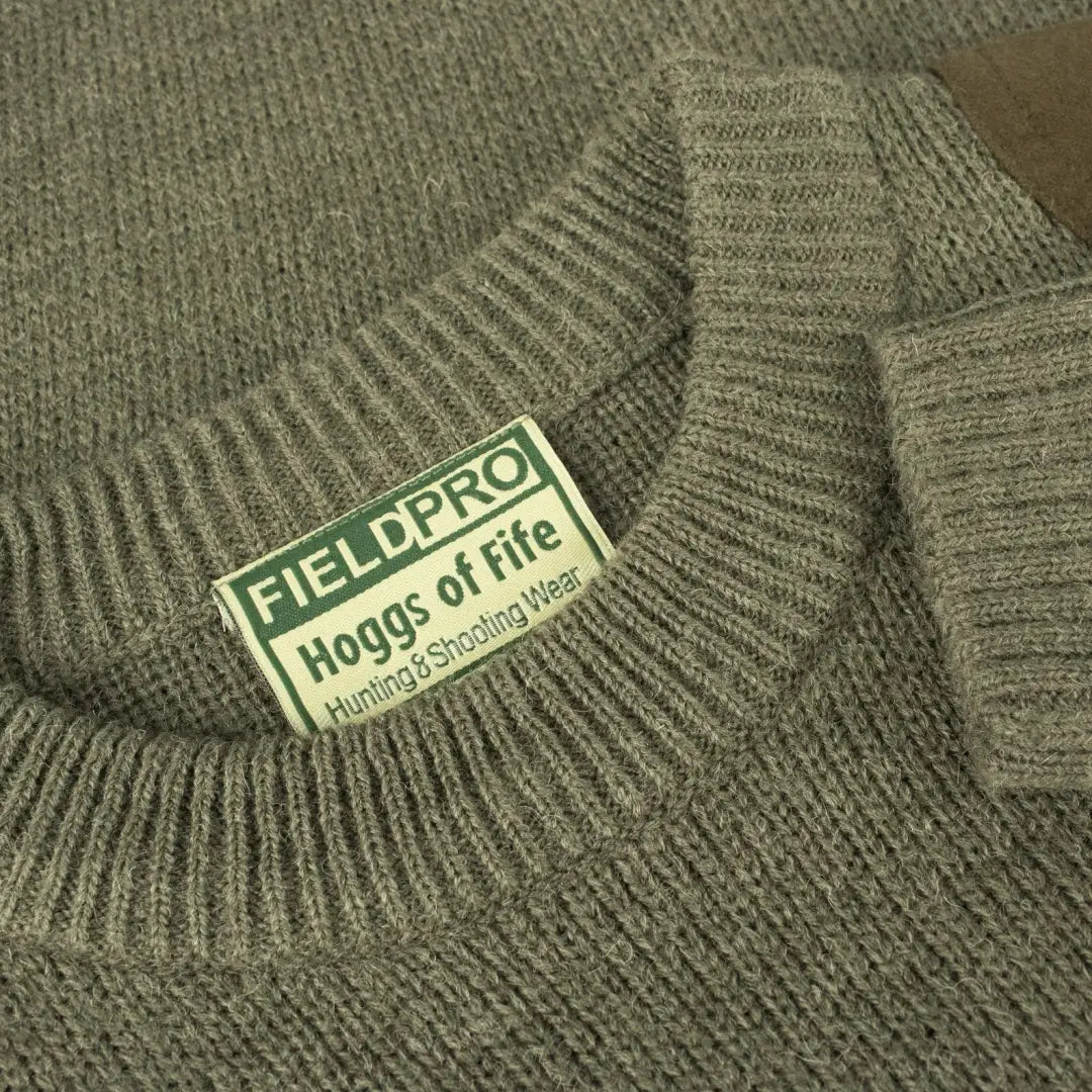 Olive green knit sweater with Fieldpro label from Hoggs Of Fife Melrose Junior Pullover