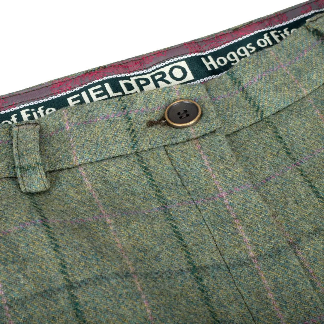 Green tweed trousers showcasing the waistband label of Hoggs of Fife Roslin Ladies Technical