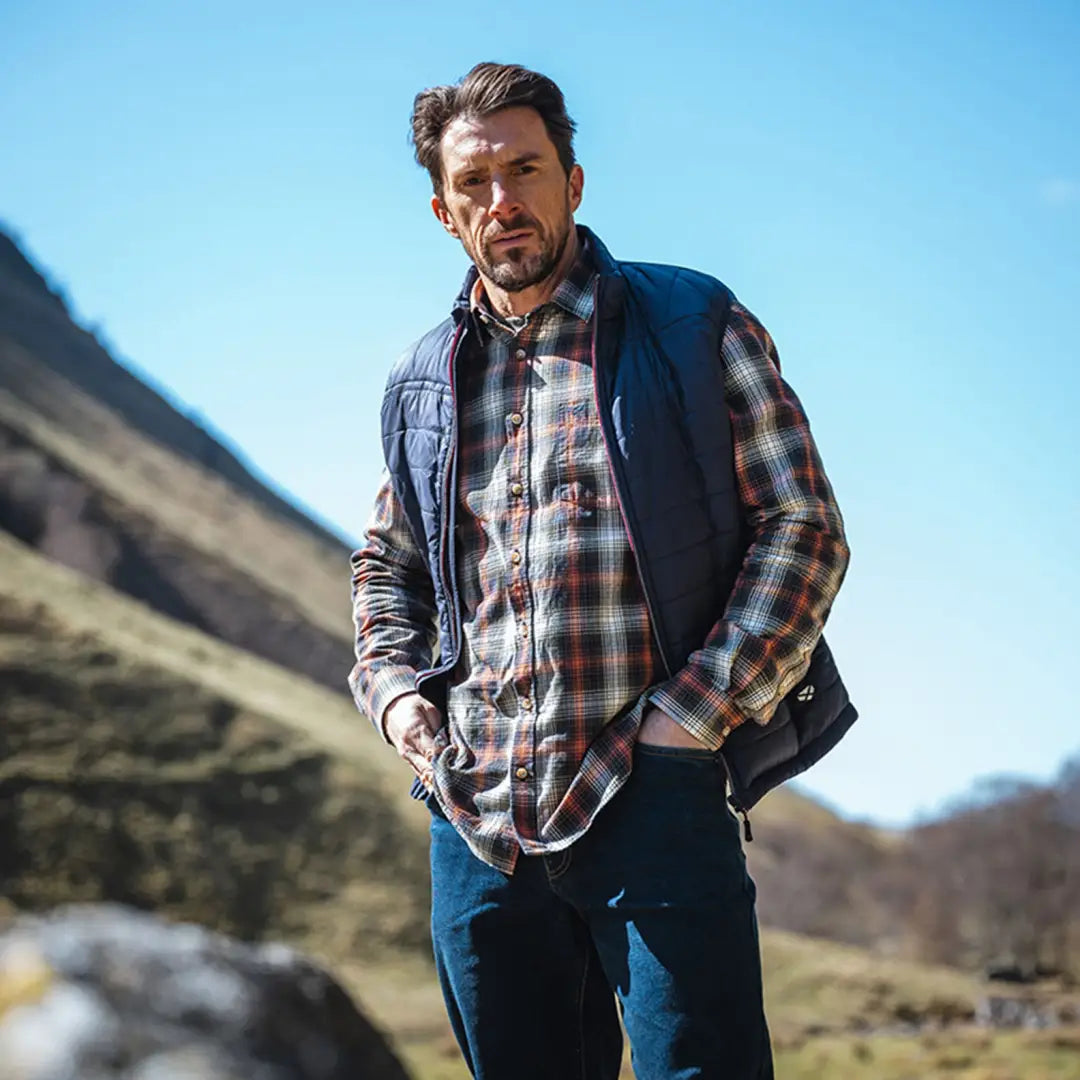 Man in a plaid Tiree shirt, lightly brushed cotton, enjoying the outdoors