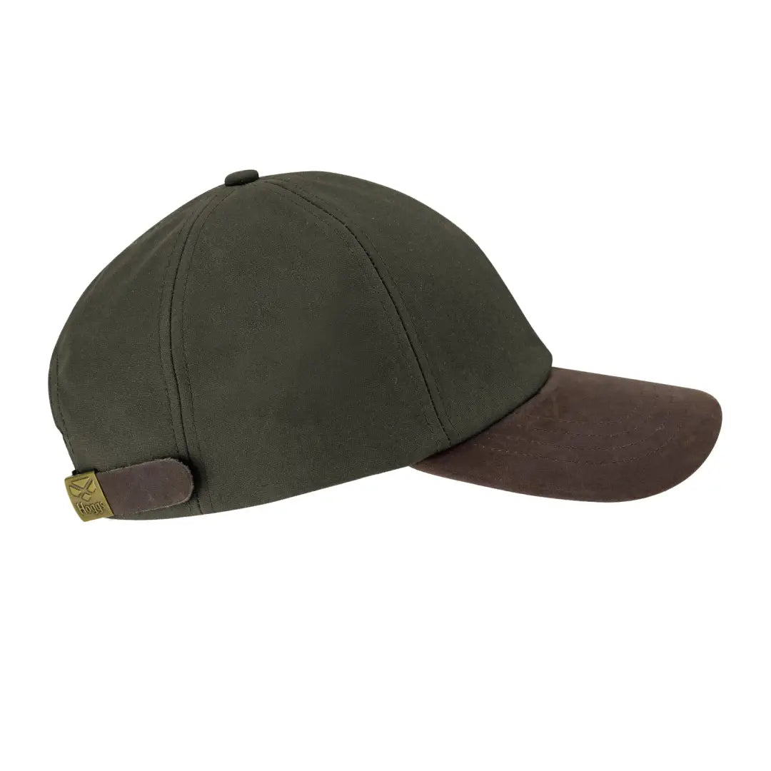 Dark green Hoggs Of Fife waxed baseball cap with a brown leather brim