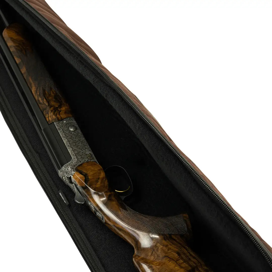 Shotgun peeking out of Jack Pyke Canvas Shotgun Slip for stylish protection