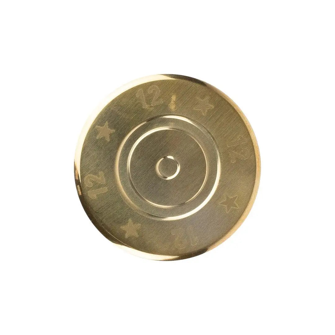 Circular brass Jack Pyke Cartridge Hip Flask with concentric rings and star patterns