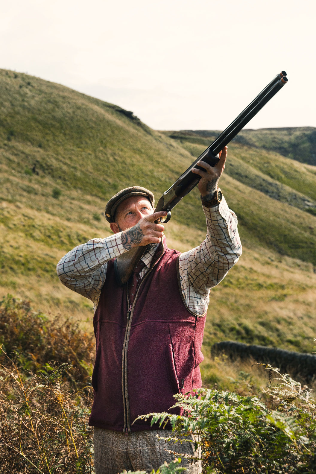 Hunter aiming shotgun in Jack Pyke Countryman Fleece Gilet made of 300gsm micro fleece