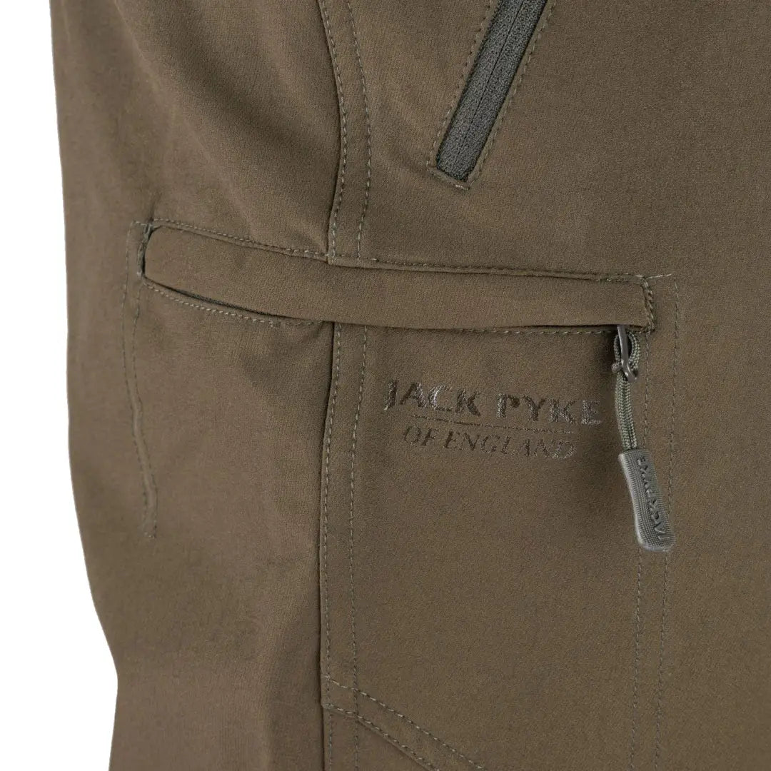 Brown Jack Pyke Dalesman Stretch Trousers pocket with embossed logo and zipper closure