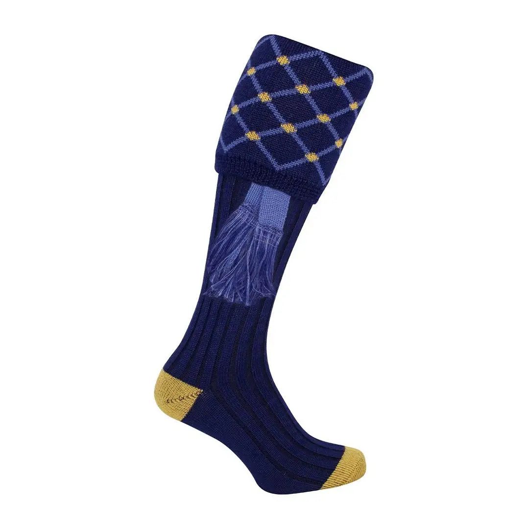 Long navy blue Jack Pyke Diamond Shooting Socks with a diamond pattern and tassels