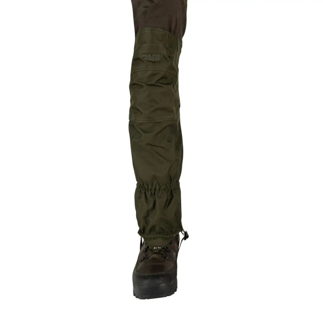 Jack Pyke Highline Gaiter featuring a military-style combat boot and olive green pant leg