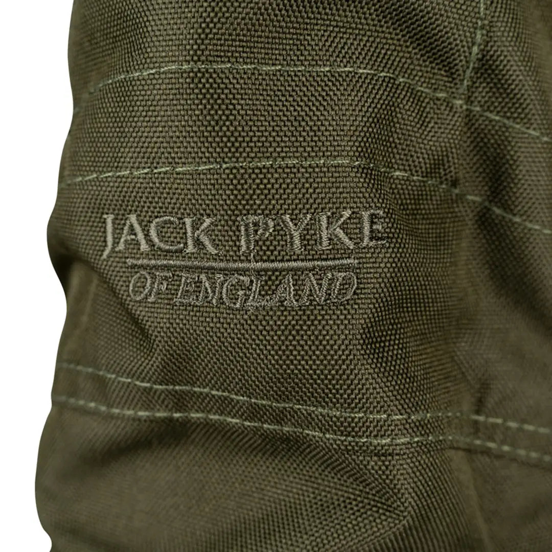 Close-up of olive green Jack Pyke Highline Gaiter with logo embroidered on fabric