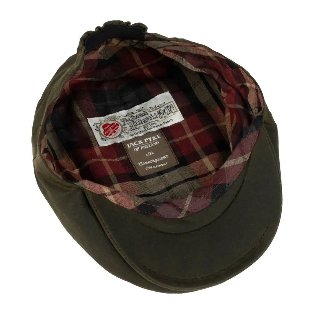 Olive green Jack Pyke Junior Wax Flat Cap with cool plaid lining inside