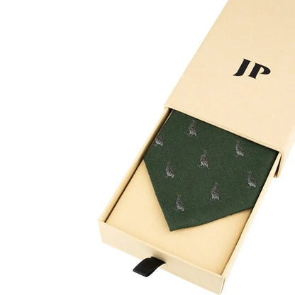 Dark green Partridge Silk Tie with animal print, shown in an open box