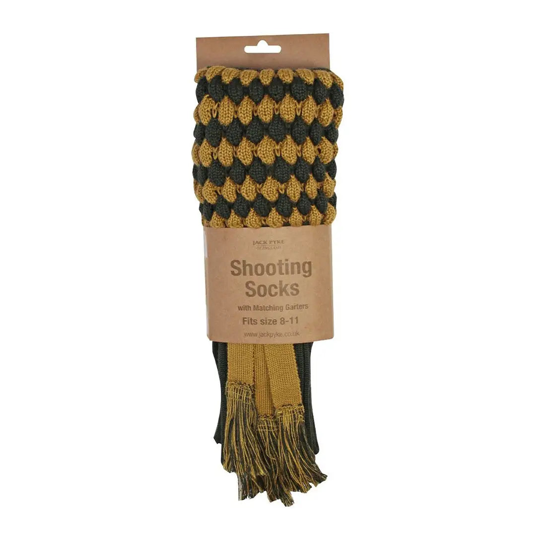 Pair of Jack Pyke Pebble Shooting Socks in green and gold with tassels and diamond pattern