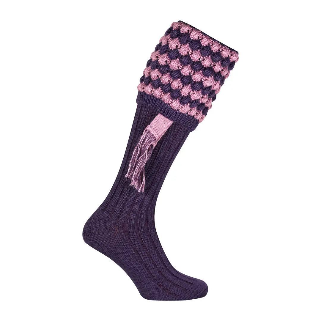 Purple and pink patterned Jack Pyke Pebble shooting socks with fun tassels