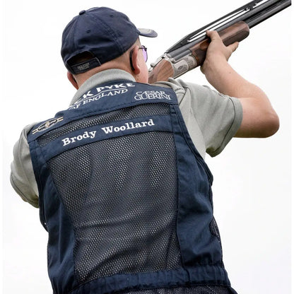 Man in a Jack Pyke Sporting Skeet Vest aiming a shotgun for target shooting