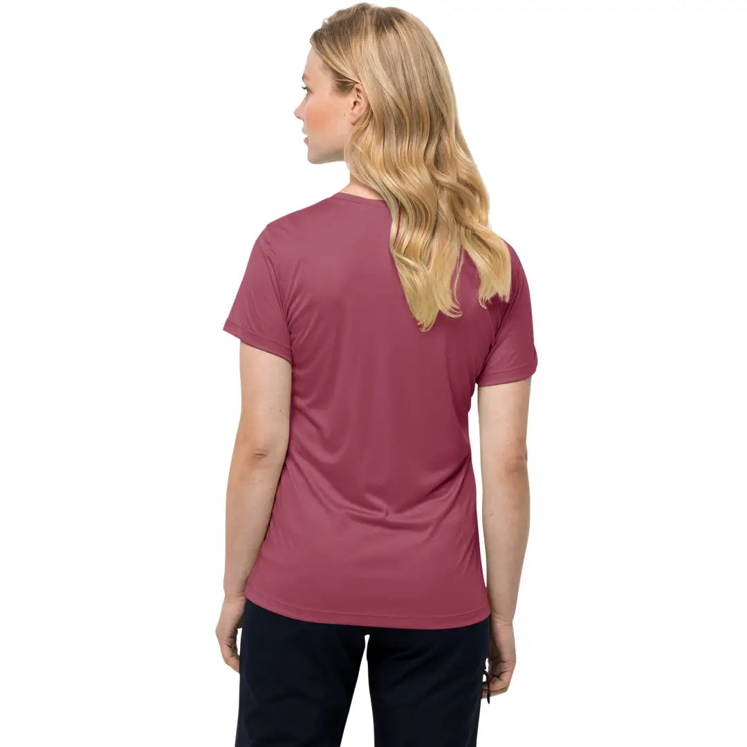 Pink Jack Wolfskin Womens Tech T-Shirt on a person with long blonde hair, viewed from behind