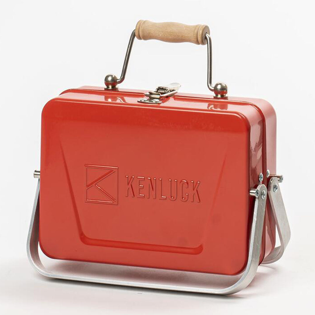 Red metal lunchbox with handle perfect for the Kenluck Mini Grill BBQ setup