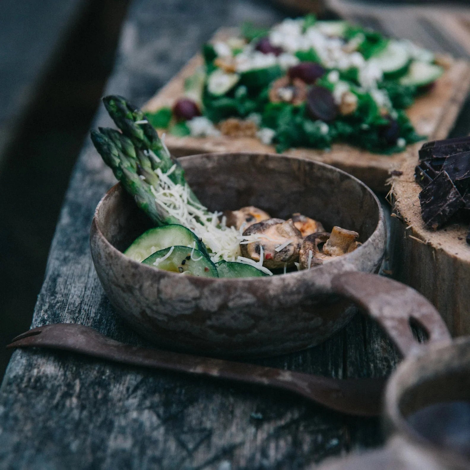 Rustic bowl of veggies in a Kupilka Bowl, perfect for country clothing lovers outdoors