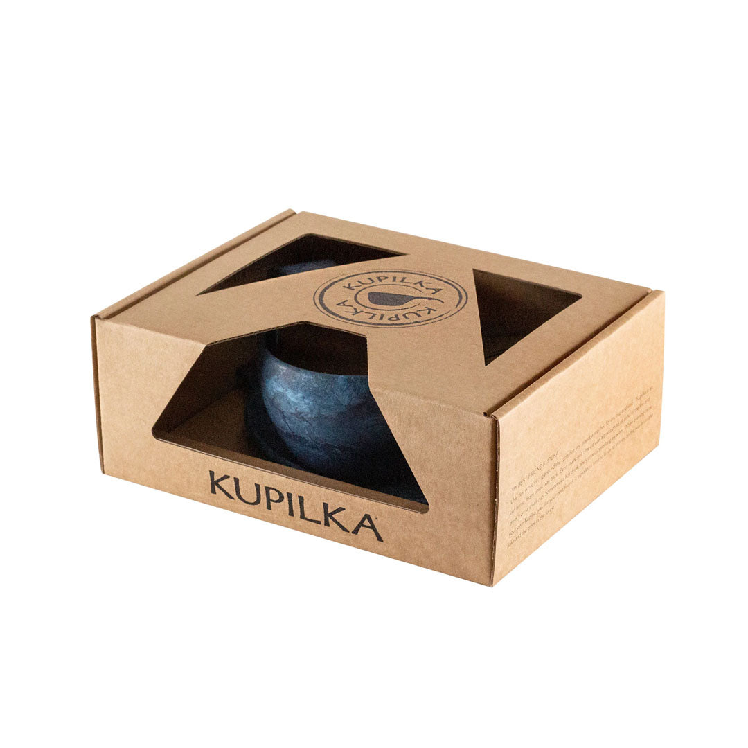 Blue cup in a cardboard box, perfect for country clothing lovers and outdoor adventures