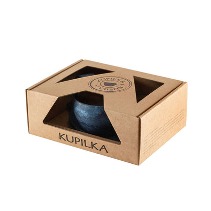 Blue cup in a cardboard box, perfect for country clothing lovers and outdoor adventures