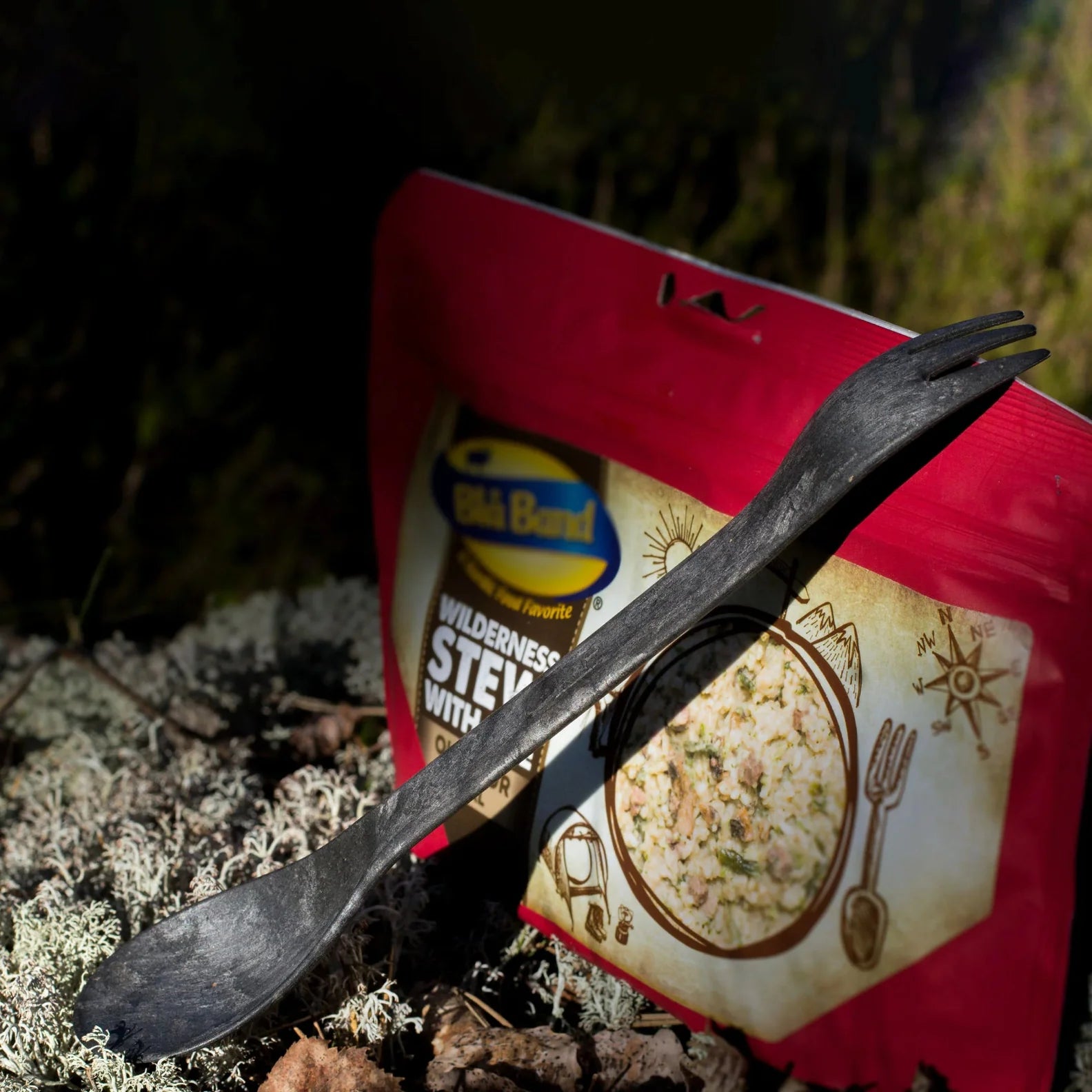 Black plastic spork from Kupilka, perfect for country clothing, hunting, and outdoors fun