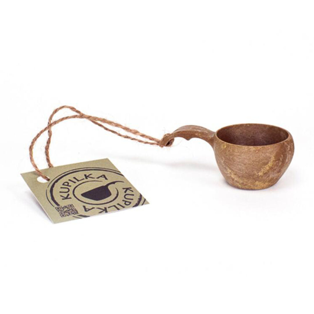 Wooden Kupilka Mini Cup with a tag showcasing its rustic charm and eco-friendly design