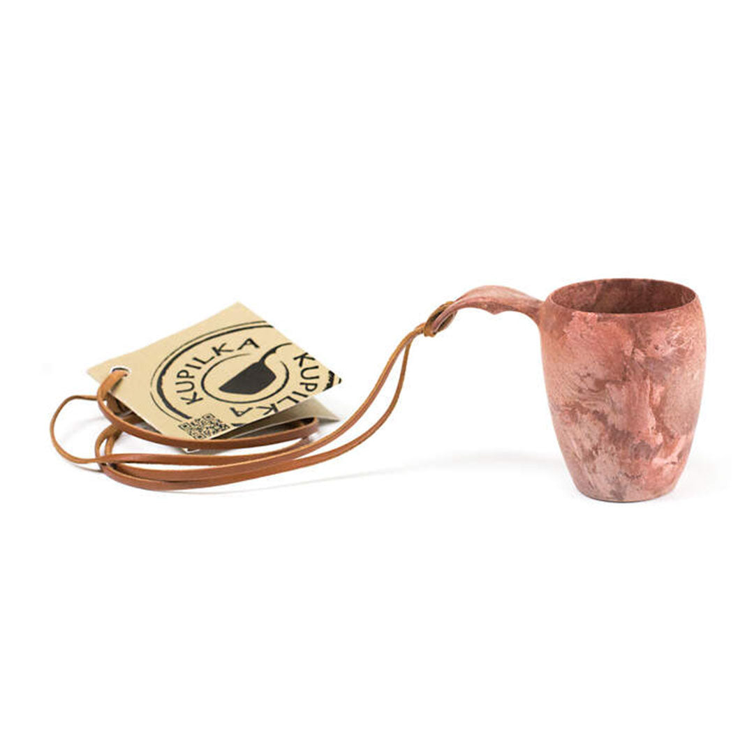 Brown wooden Kupilka shot cup with tag and leather strap, perfect for country clothing and hunting