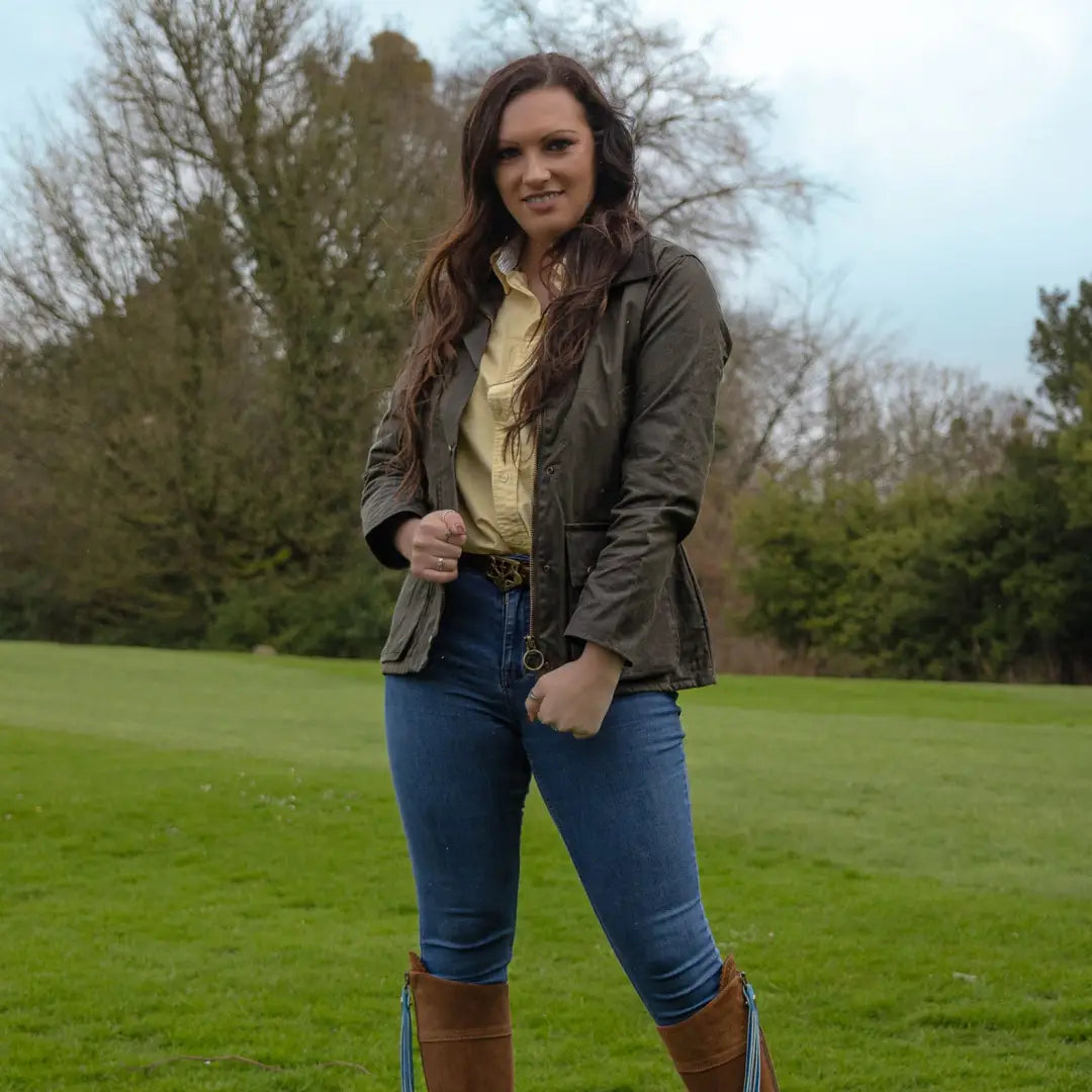 Woman in casual autumn style wearing a stylish Antique Wax Jacket outdoors