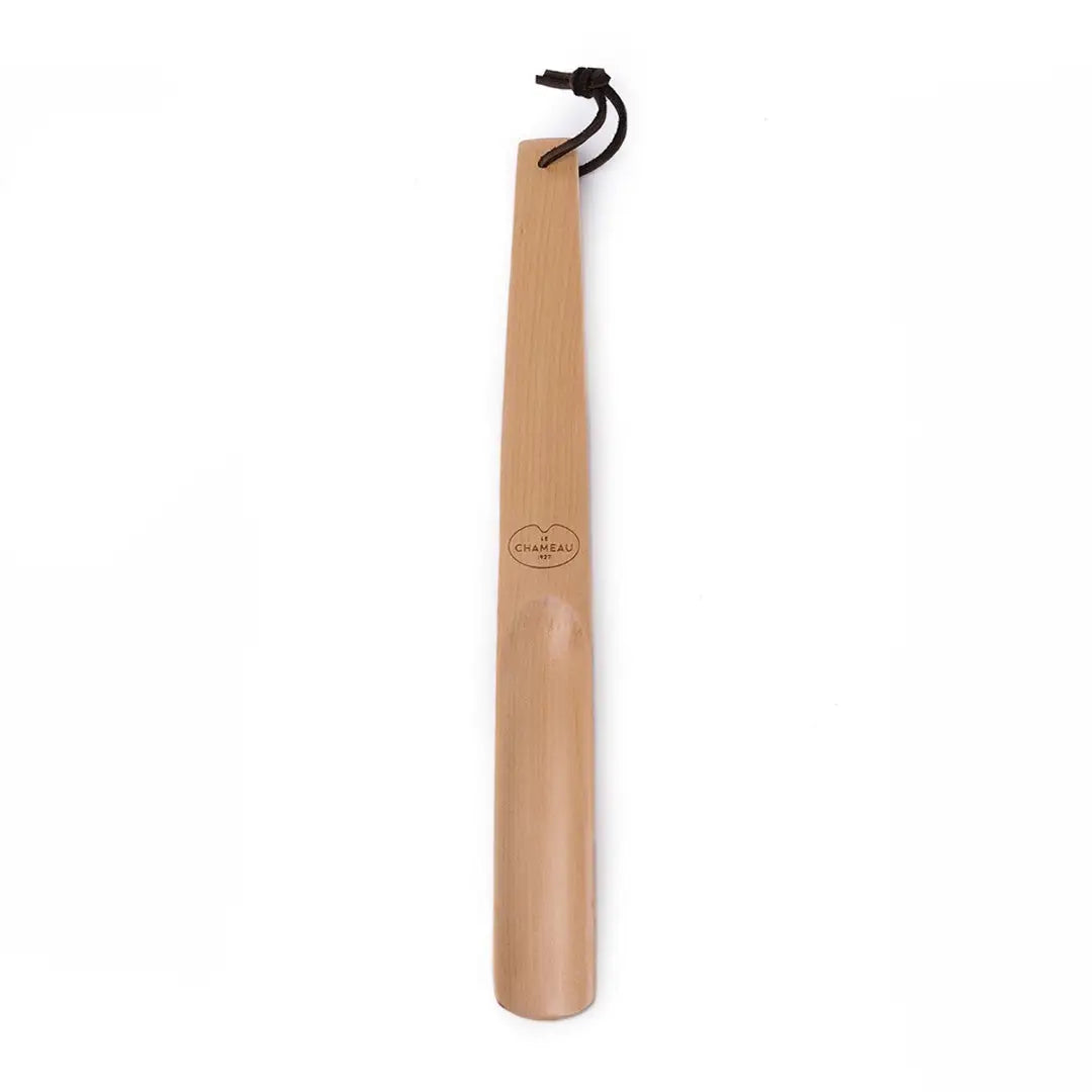 Wooden shoe horn with leather strap for easy hanging from the Le Chameau Shoe Horn