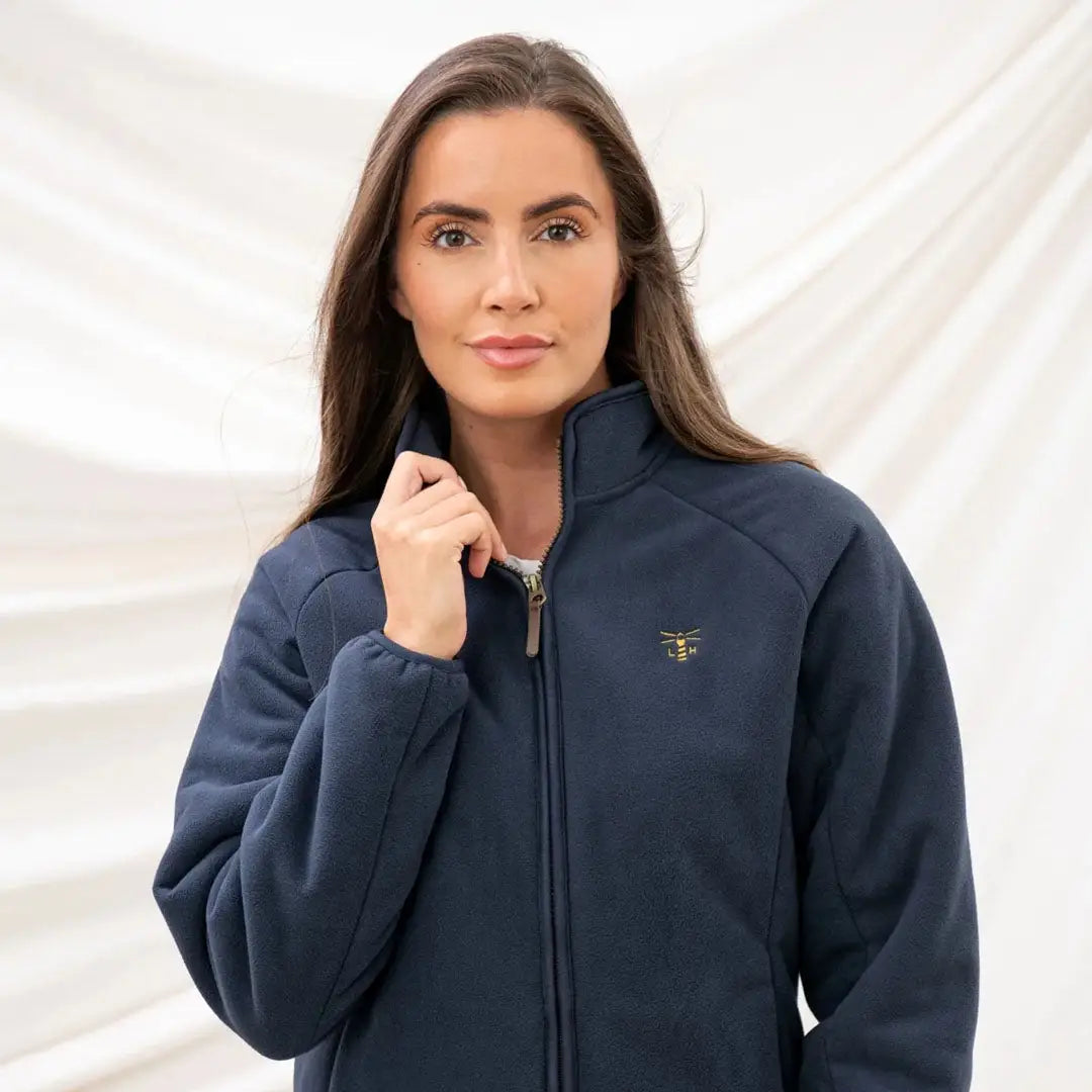 Navy blue zip-up fleece jacket in anti-pill brushed fleece with embroidered logo