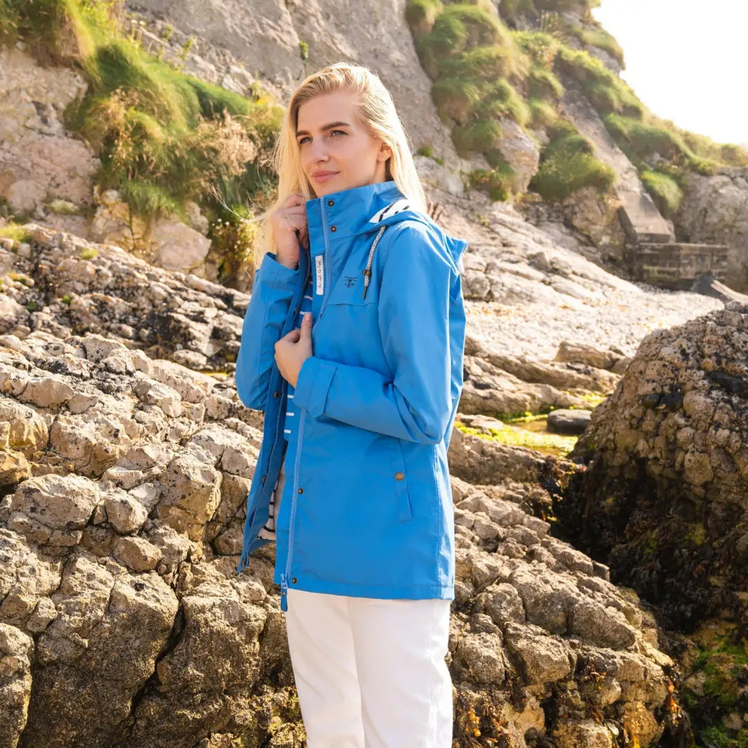 Blue Lighthouse Beachcomber Coat with hood and zipper, featuring soft jersey lining