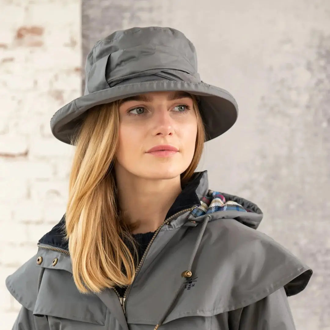 Gray wide-brimmed Lighthouse Canterbury Waterproof Ladies Hat on a blonde woman