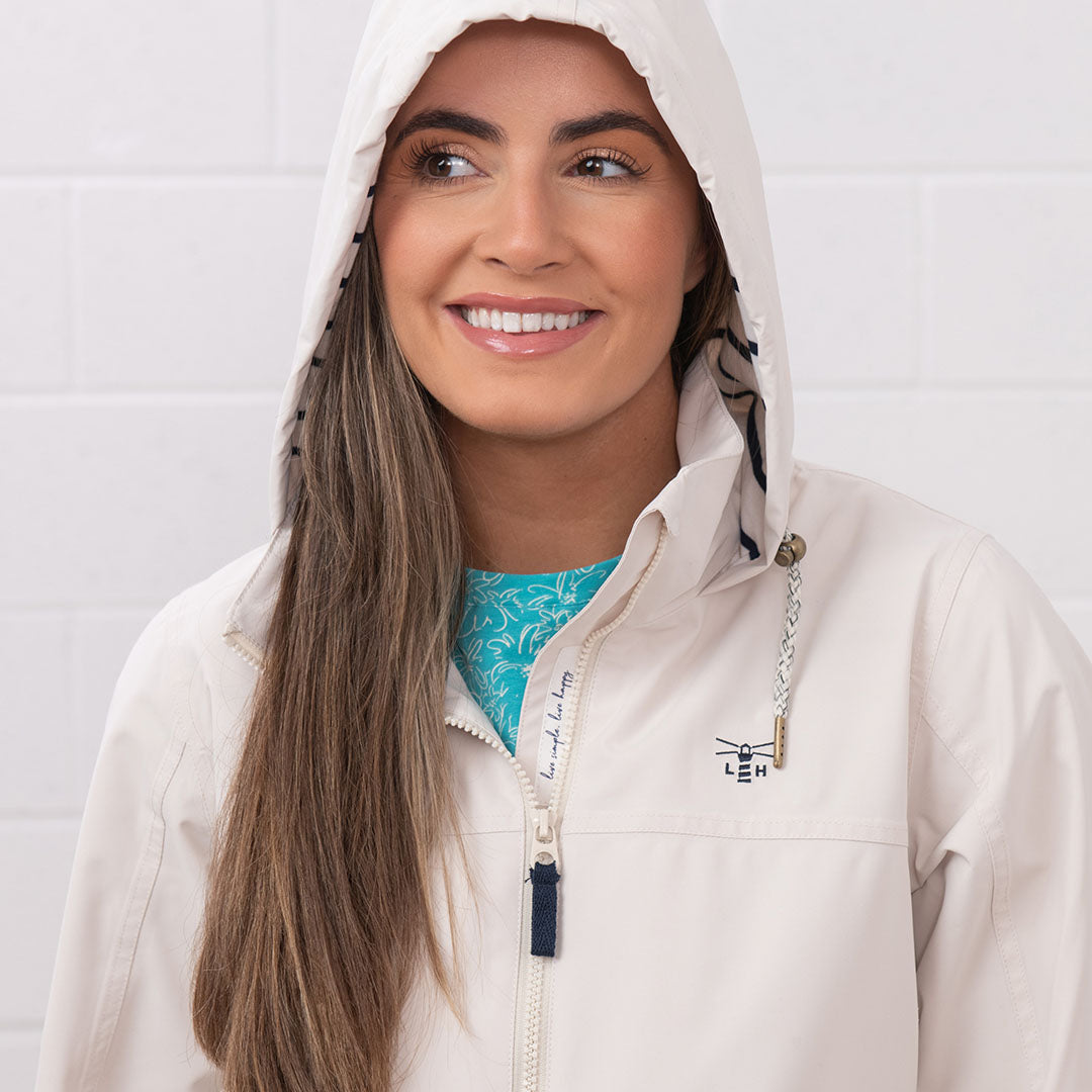 Beige hooded jacket from the Lighthouse Ladies Beachcomber II Coat collection