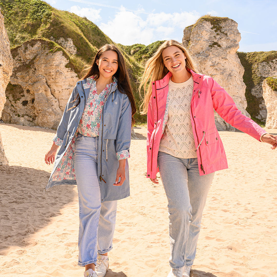 Two women rocking colorful jackets in their Lighthouse Ladies Pippa Coats