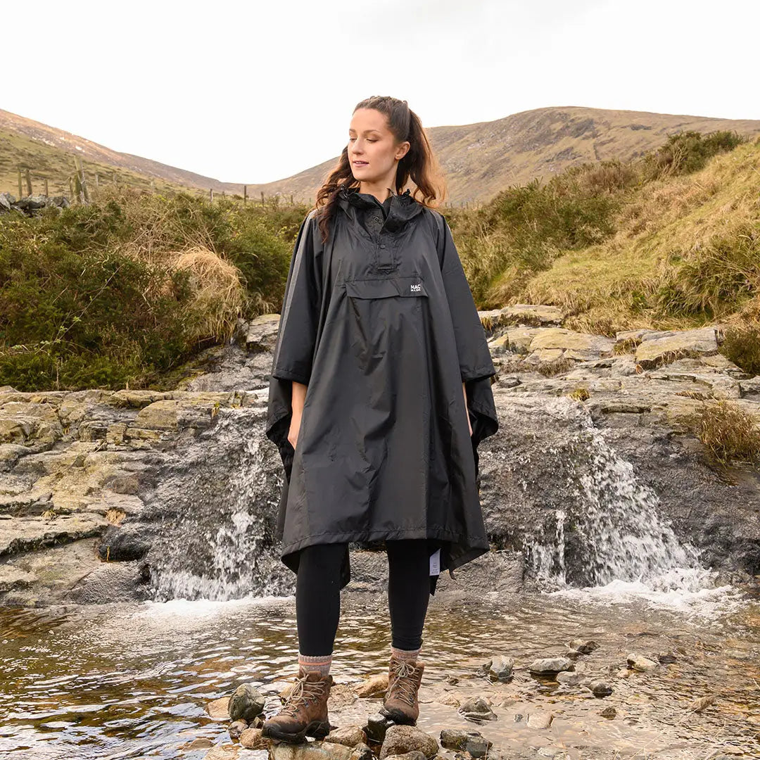 Waterproof Mac In A Sac Origin 2 Poncho with wrist straps, perfect for country clothing adventures