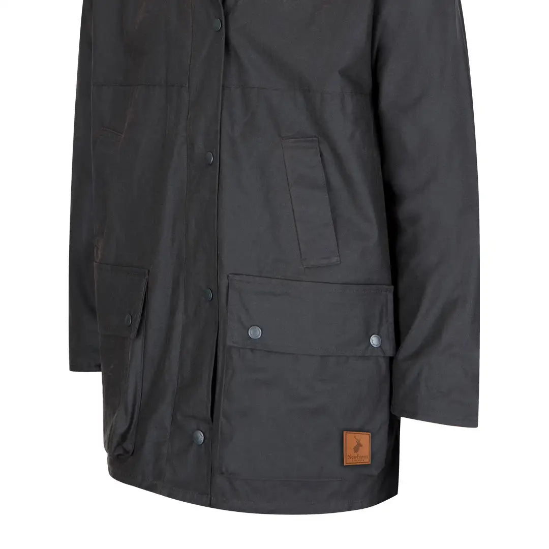 Black traditional wax jacket with pockets and leather patch, perfect for forest clothing