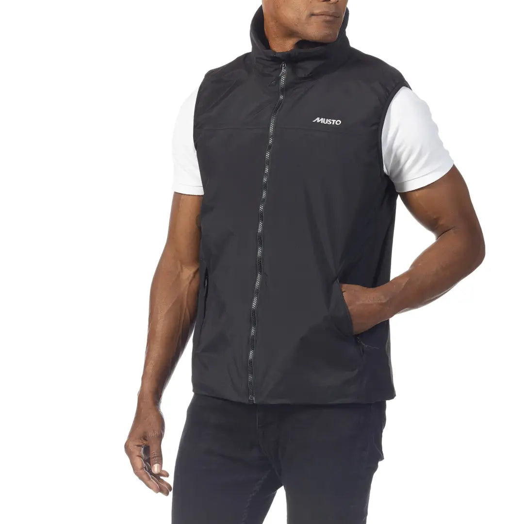 Black Musto Snug Vest 2.0 showcasing stylish branding and a comfy zip-up design